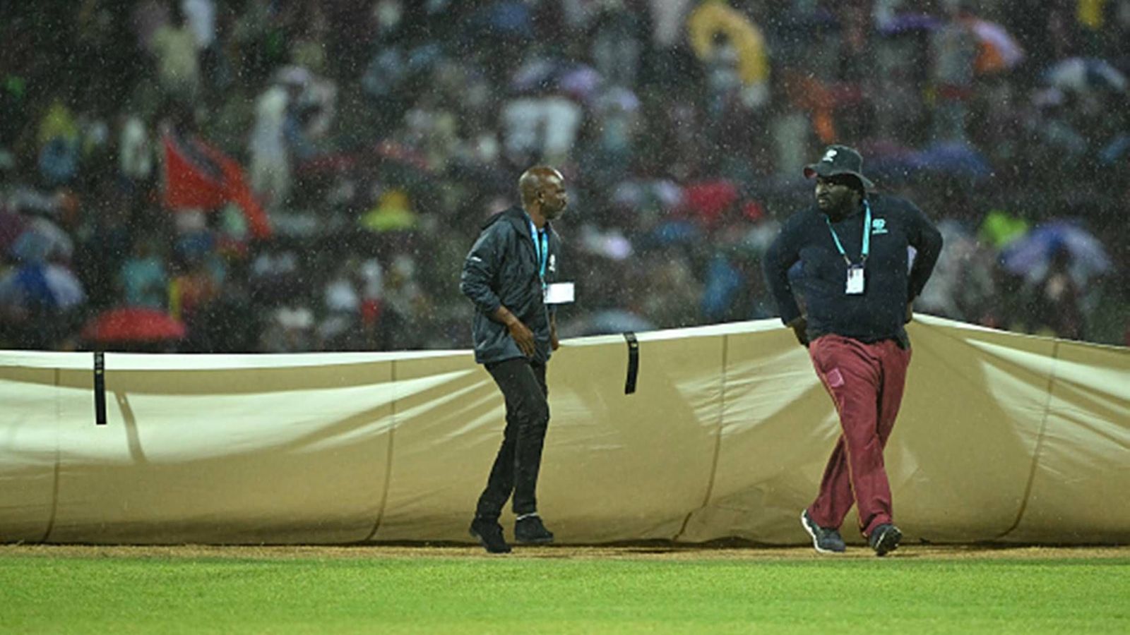 Strong showers interrupt West Indies' must-win game against South Africa, who will enter the semifinal if game gets washed out? Rain covers are deployed on the field after a sudden downpour during the Super 8 match between West Indies and South Africa in Antigua (Getty Images)