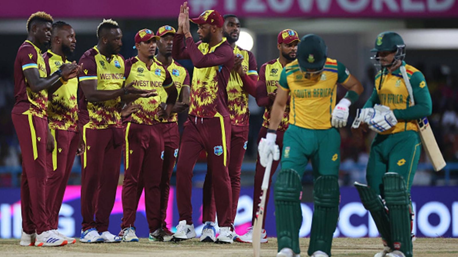 What will be South Africa's DLS target against West Indies to reach semifinals after rain interruption in St Lucia? West Indies players celebrate Reeza Hendricks' wicket (Getty Images)