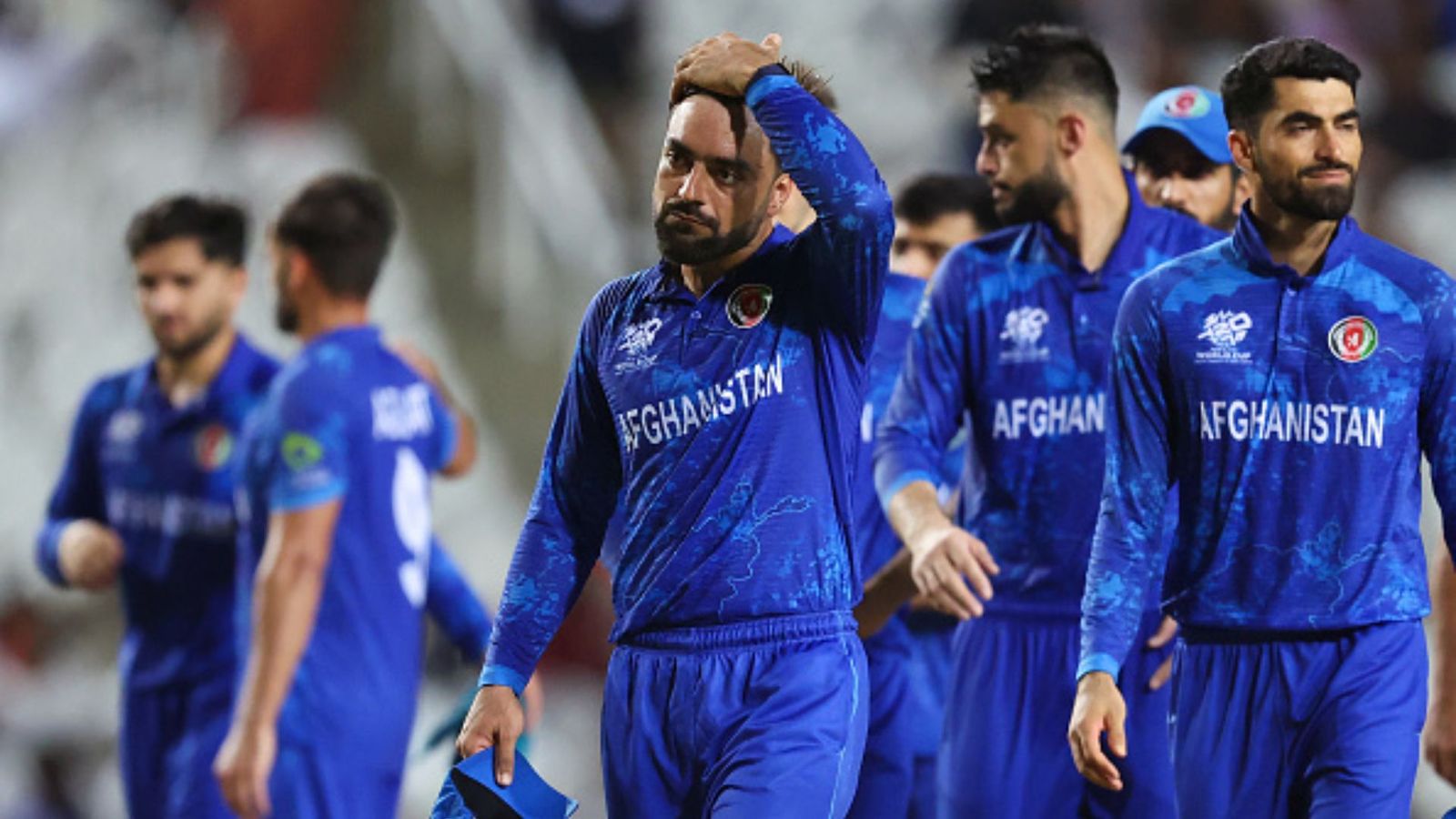 'Tough for us.. might have done better': Rashid Khan opens up on heartbreaking end to dream run in T20 World Cup 2024 Rashid Khan and Afghanistan team in frame (Getty)