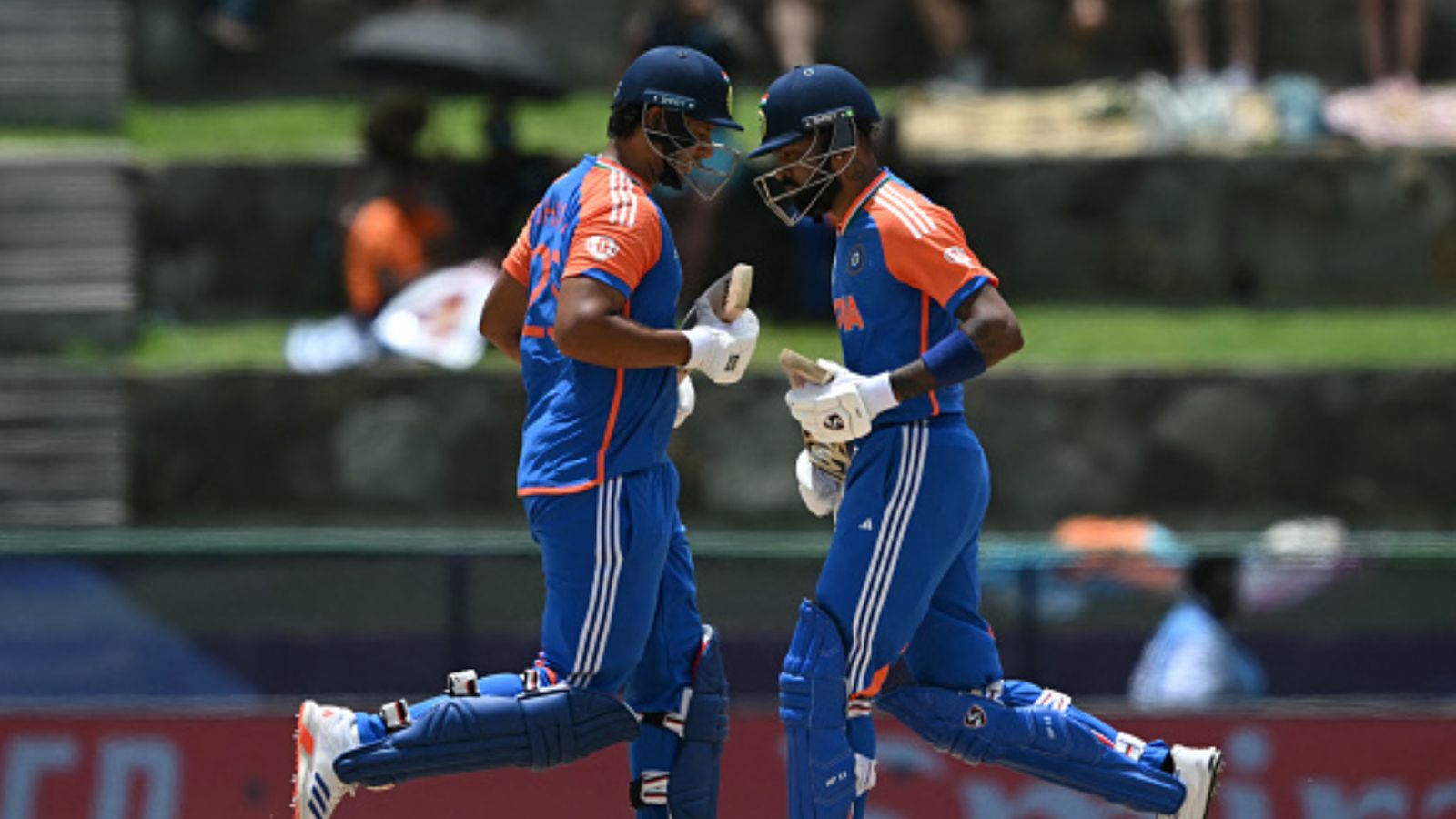 Stephen Fleming rooting for this India star in T20 World Cup semifinal against England' says 'he's definitely going to be a weapon...' India's Shivam Dube (L) and Hardik Pandya run between wickets during their T20 World Cup clash against Bangladesh at Sir Vivian Richards Stadium in North Sound, Antigua and Barbuda, on June 22. (Getty)