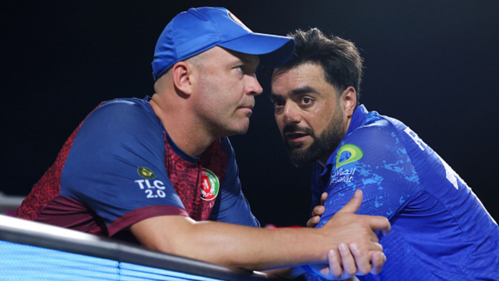 'Don't want to get myself into trouble, but...': Jonathan Trott calls for 'fair contest' following Afghanistan's agonizing semifinal loss vs SA Afghanistan head coach Jonathan Trott (left) and captain Rashid Khan in this frame. (Getty)