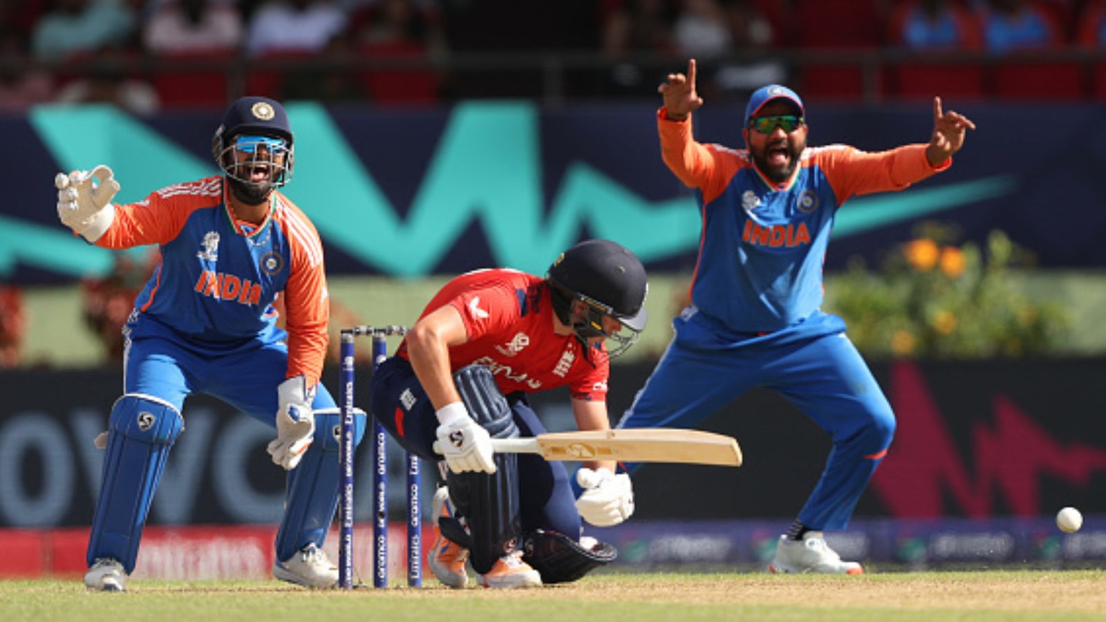 Rohit Sharma answers million-dollar question on ending India's ICC trophy drought following T20 World Cup semifinal victory over England India's Rishabh Pant (L) and Rohit Sharma appeal successfully for the wicket of Sam Curran of England during T20 World Cup final against England on June 27. (Getty)