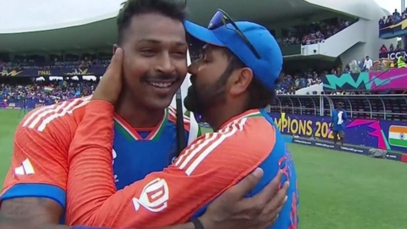 WATCH: Rohit Sharma storms into Hardik Pandya's post-match interview to plant a kiss on his cheek while celebrating India's T20 World Cup glory Rohit Sharma planted a kiss on Hardik Pandya's cheek while celebrating India's T20 World Cup title triumph on June 29. (Screengrab-X)