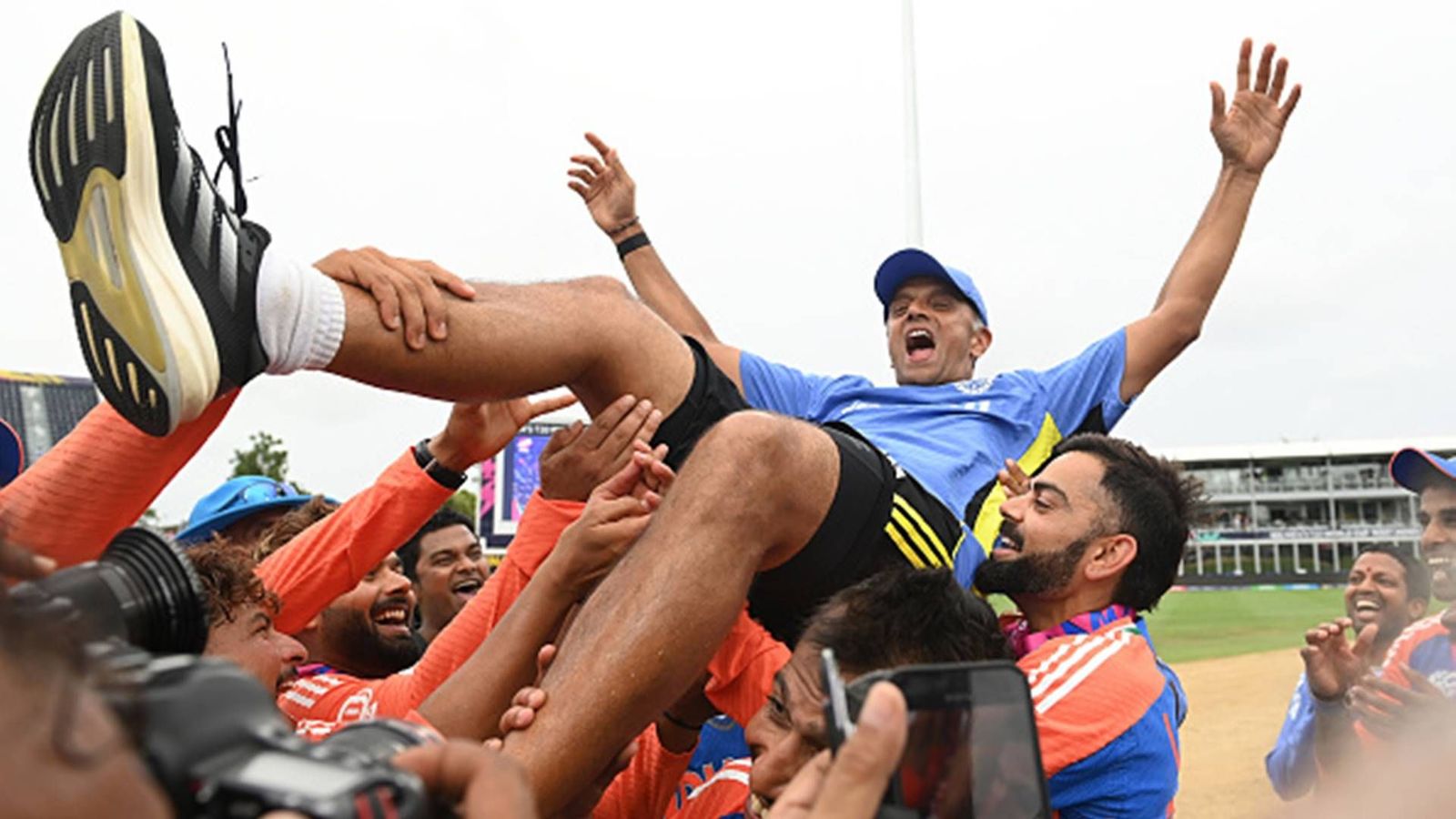 Watch: Rohit Sharma, Virat Kohli and other players lift Rahul Dravid as head coach bids goodbye to Team India Rahul Dravid, India head coach is thrown into the air by players after India win T20 World Cup 2024 (Getty Images)