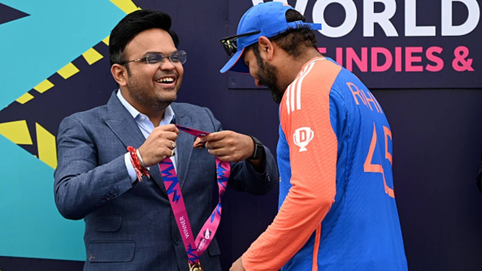 Will Rohit Sharma, Virat Kohli play in Champions Trophy 2025? Jay Shah says 'the seniors will be...' Jay Shah giving a gold medal to Rohit Sharma after T20 World Cup 2024 win (Getty Images)