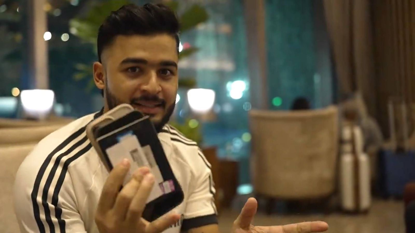 Riyan Parag does a Rohit Sharma, forgets passport, phone before boarding flight for Zimbabwe; watch video Riyan Parag shows his phone and passport (Screengrab: X, BCCI)