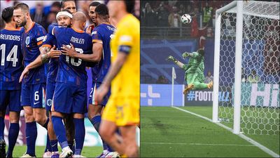 Netherlands blank Romania to reach Euro quarterfinal for first time since 2008, Gunok's 'save of the century' helps Turkey beat Austria 2-1 Mert Gunok puts in a save; Netherlands players celebrate their win over Romania (Getty Images)