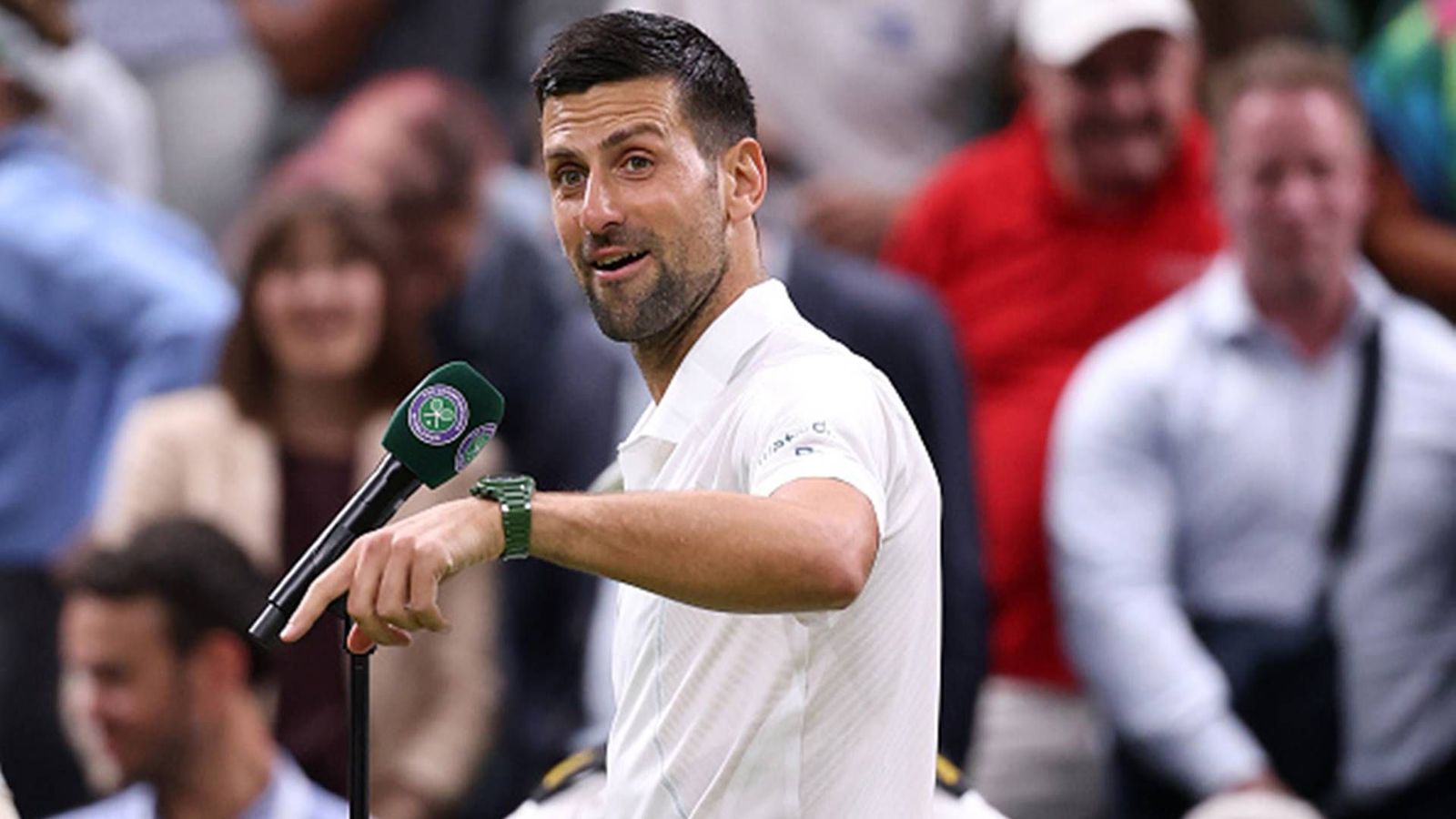 'You guys can't touch me': Novak Djokovic slams rude fans after reaching Wimbledon quarterfinals in hilarious post-match speech; watch video Novak Djokovic addresses the crowd at Centre Court after defeating Holger Rune (Getty Images)