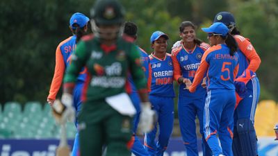 Women's Asia Cup 2024: Renuka, Radha run riot as India demolish Bangladesh by 10 wickets to storm into final for ninth time in a row India's Radha Yadav (centre) celebrates the wicket of Rumana Ahmed (L) of Bangladesh with teammates during Women's T20 Asia Cup semifinal at Dambulla on July 26. (Getty)