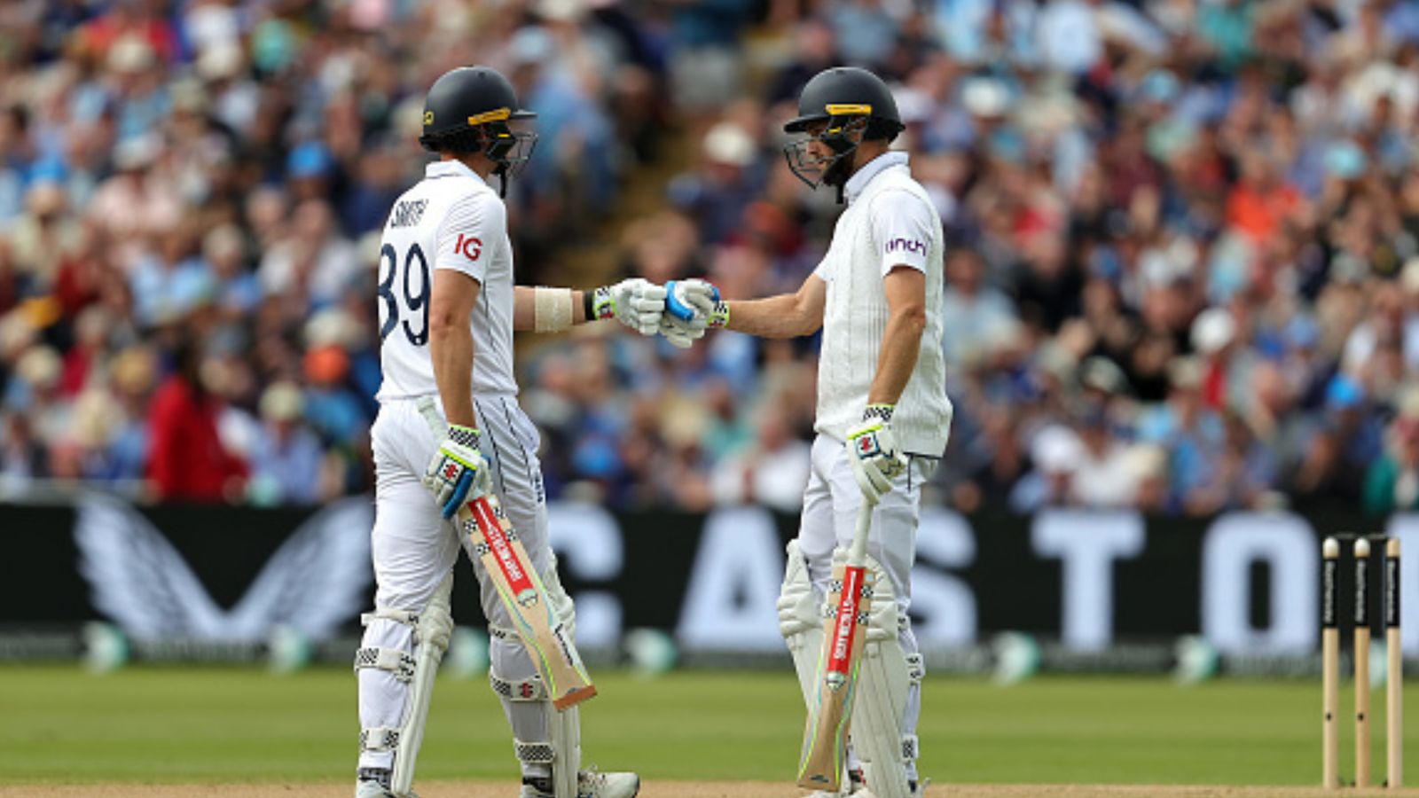 ENG vs WI: Jamie Smith's 95, Joe Root's 87 power England to commanding position on Day 2 of 3rd Test against West Indies England's Jamie Smith (L) and Chris Woakes touch gloves in their batting partnership during Day 2 of the 3rd Test against West Indies at Edgbaston on July 27. (Getty)