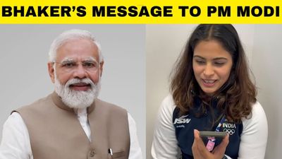 Manu Bhaker interacts with Prime Minister Narendra Modi after winning historic shooting bronze SportsTak