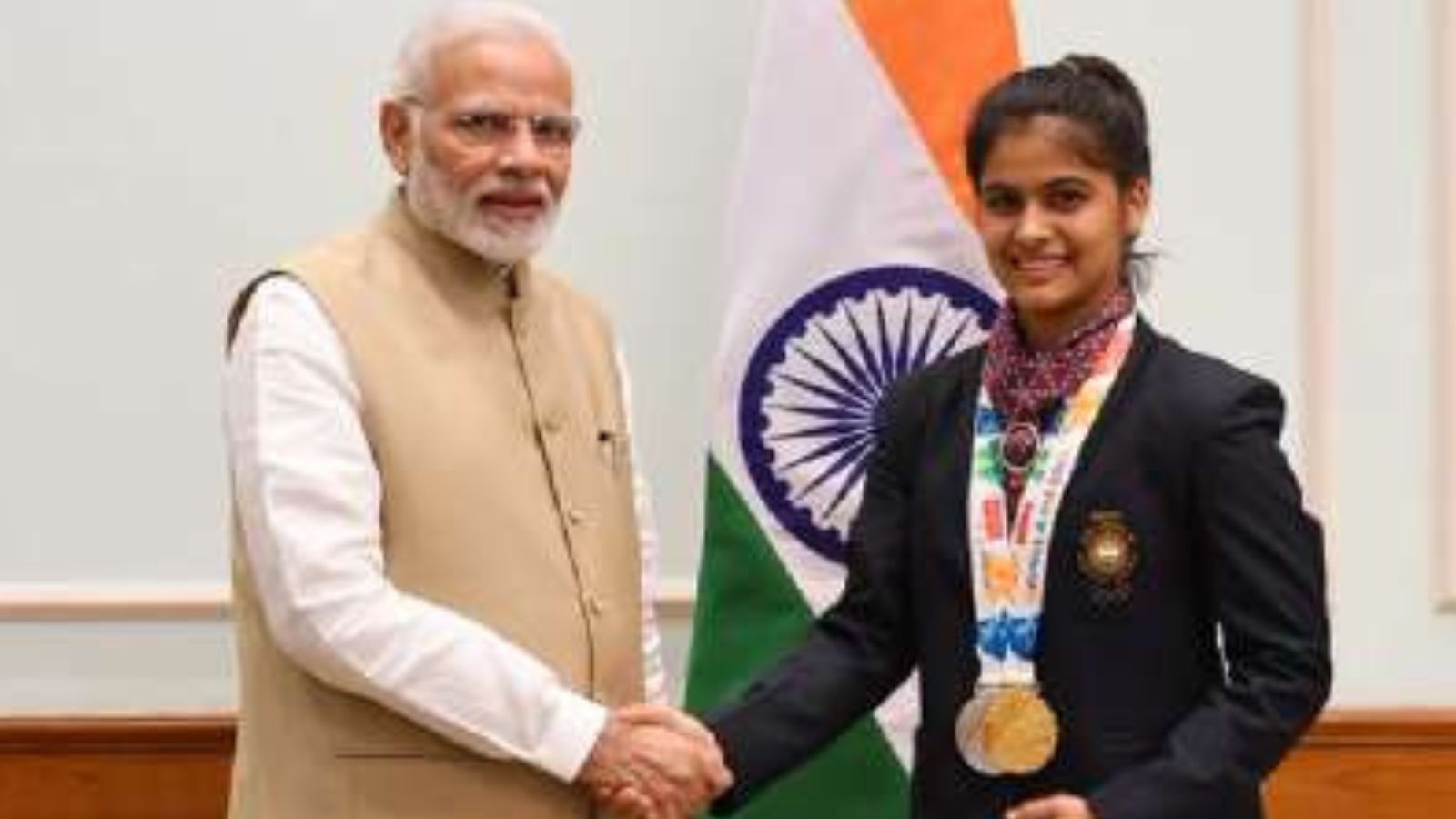 WATCH: PM Modi interacts with Manu Bhaker on phone after her landmark bronze at Paris Olympics, says 'you missed silver by 1 point but...' PM Narendra Modi (left) and India's star shooter Manu Bhaker in this frame. (X)