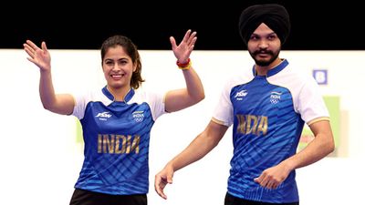 Manu Bhaker achieves what no Indian athlete could in Olympic history since independence with two medals in Paris Manu Bhaker and Sarabjot Singh wave to the crowd after winning bronze medal at Paris Olympics 2024 (Getty Images)