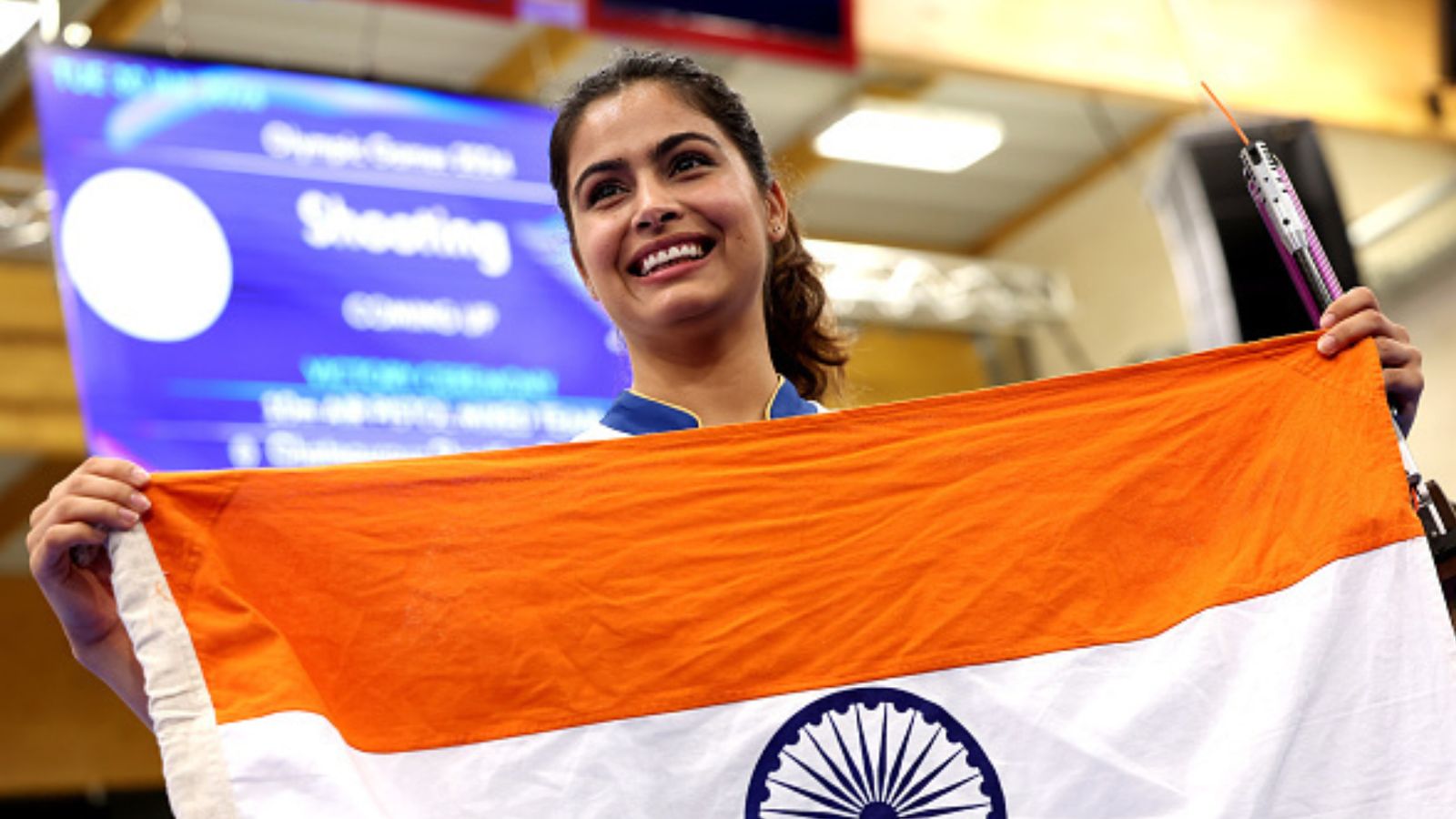 'The past should remain in past...': Why did Manu Bhaker say this after clinching second bronze for India in shooting at Paris Olympics? India's Manu Bhaker celebrates winning the bronze medals along with Sarabjot Singh (not pictured) after the 10m Air Pistol Mixed Team Bronze Medal Match at the Paris Olympics 2024. (Getty)