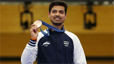 From Podium to Promotion: Swapnil Kusale's Olympic Bronze Medal helps him reach Officer Rank in Railways after 9 Years Swapnil Kusale in frame (Getty)