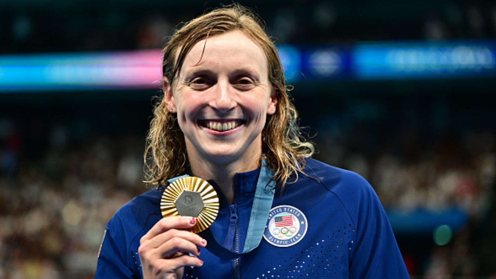 Paris Olympics: Who is Katie Ledecky, who scripted World Record by clinching 13 Olympic medals? Katie Ledecky of Team United States poses with her Gold medal after the Swimming medal ceremony after the Women's 1500m Freestyle Final on day five of the Olympic Games Paris 2024. (Getty)