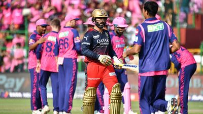 RCB mentor and batting coach Dinesh Karthik set to play for Royals, becomes 1st Indian to sign up for this league Former RCB batter Dinesh Karthik returns to pavillion after losing his wicket against Rajasthan Royals (File Photo: Getty Images)