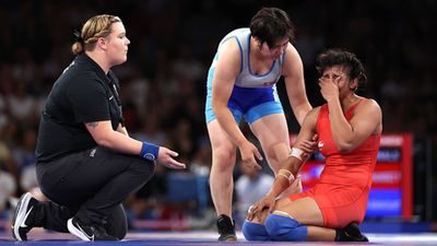 '100 percent intentional, there was an instruction from Korean corner': Nisha Dahiya's coach furious after wrestler misses semifinal spot freak injury Nisha Dahiya reacts after getting injured during bout against Sol Gum Pak (Getty Images)