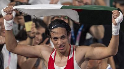 Gold medalist boxer Imane Khelif takes legal action against online harassment following gender row at Paris Olympics Imane Khelif of Team Algeria celebrates as she wins gold medal after defeating Liu Yang (blue) of China in the Boxing Women's 66kg Final match at Paris Olympics. (Getty)