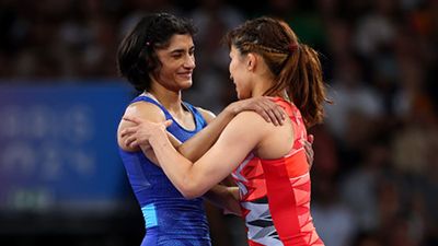 'I'm sorry and frustrated that I committed a betrayal': Japan wrestler whose 82-match winning streak was ended by Vinesh Phogat apologises to fans Japan's Yui Susaki and India's Vinesh Phogat interact at the Paris Olympics (Getty Images)
