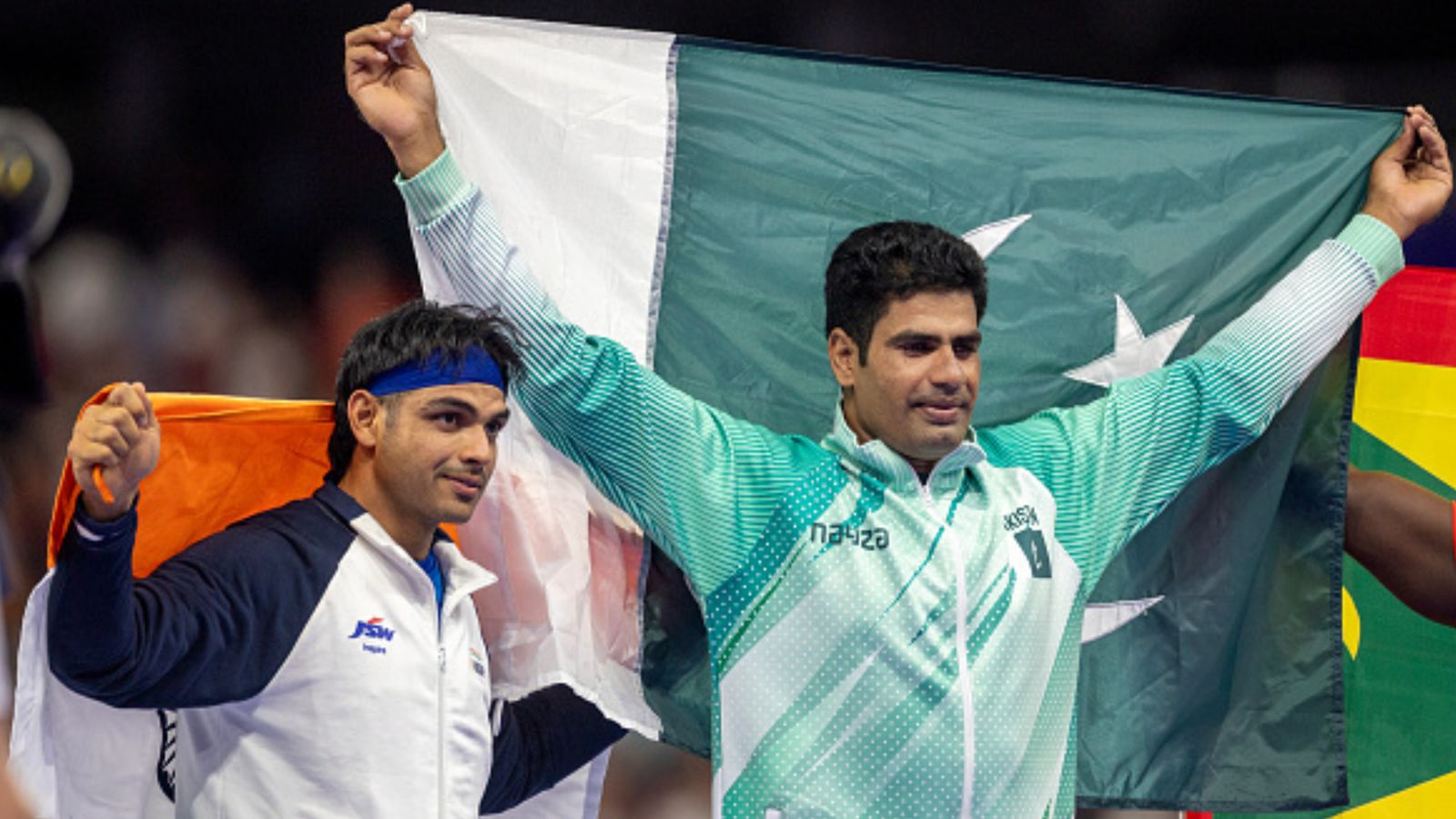 Arshad Nadeem reveals how he battled injury to defeat Neeraj Chopra and win gold in Paris Olympics, says 'felt pain during first throw…’ Pakistan's javelin hero Arshad Nadeem (right) and India's Neeraj Chopra in this frame. (Getty)