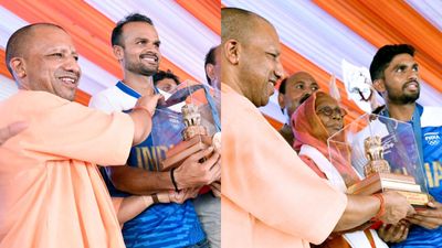 UP CM Yogi Adityanath felicitates Indian hockey players Lalit Upadhyay, Rajkumar Pal for Paris Olympics bronze medal Yogi Adityanath with Lalit Upadhyay and Rajkumar Pal