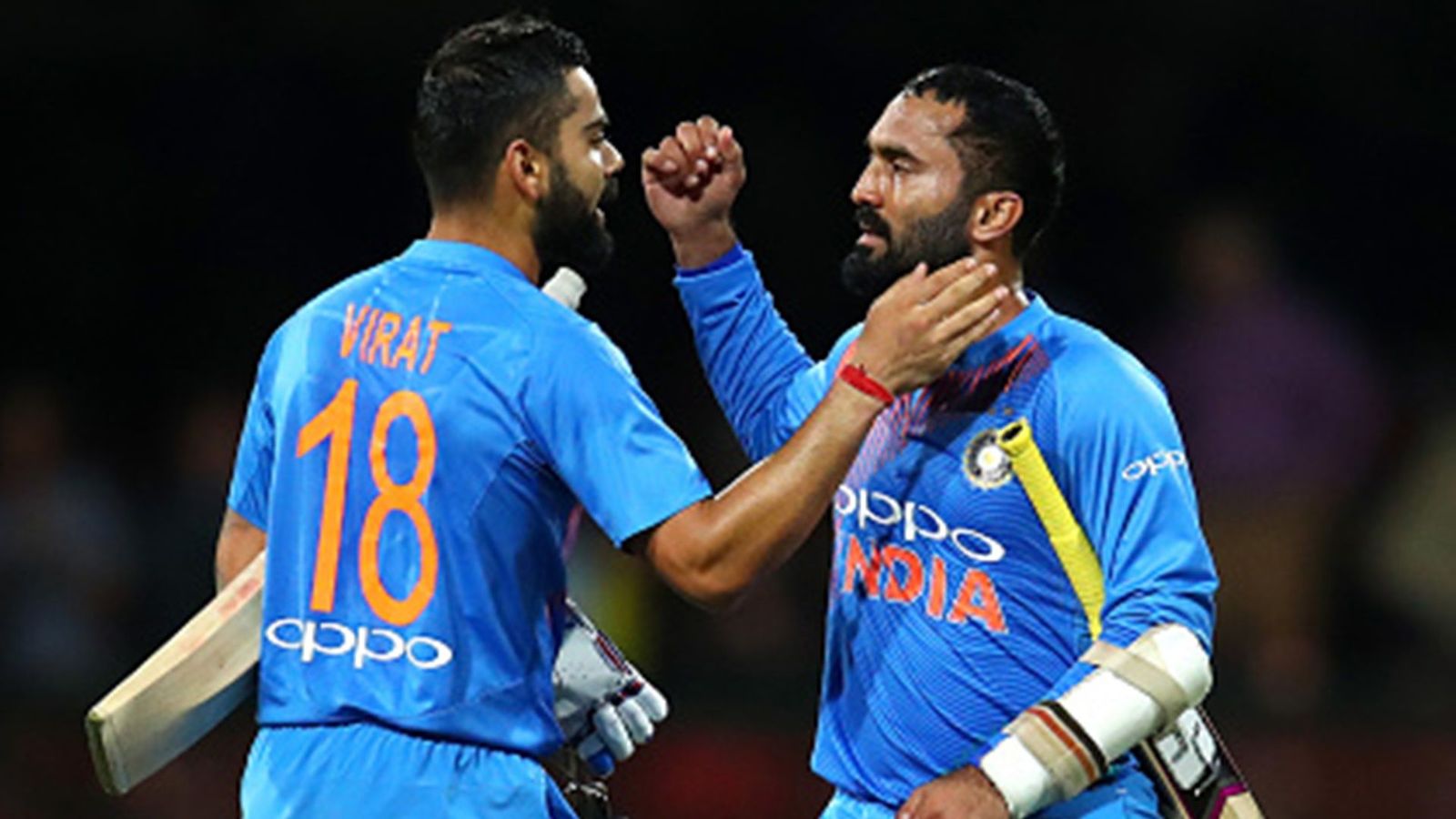 Dinesh Karthik posts heartfelt message as Virat Kohli completes 16 years in international cricket, says 'fire still burns bright' Virat Kohli and Dinesh Karthik celebrate the win (File Photo: Getty Images)