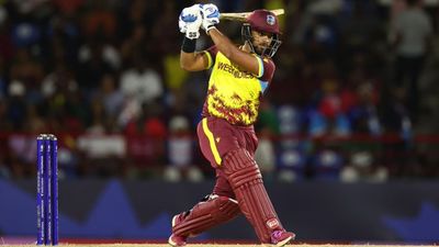 Nicholas Pooran leaves Jos Buttler, Suryakumar Yadav behind with 7 sixes against South Africa in 1st T20I Nicholas Pooran plays a shot against South Africa in first T20I (Getty Images)