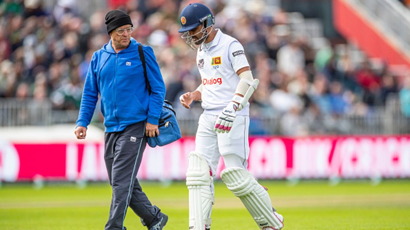 'If they could hang in there for 10-15 overs, we could have...': 'Over the moon' Dinesh Chandimal blames tailenders for loss to England in 1st Test Dinesh Chandimal leaves the field after getting hit on thumb by Mark Wood's delivery (Getty Images)