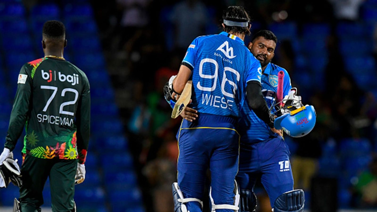 CPL 2024: Former LSG batter's 54-ball 100 in vain as ex-PBKS batter & ex-KKR wicketkeeper's fiery fities help Kings chase down 202 with ease Bhanuka Rajapaksa and David Wiese after 5-wicket win over St Kitts and Nevis Patriots (Getty Images)