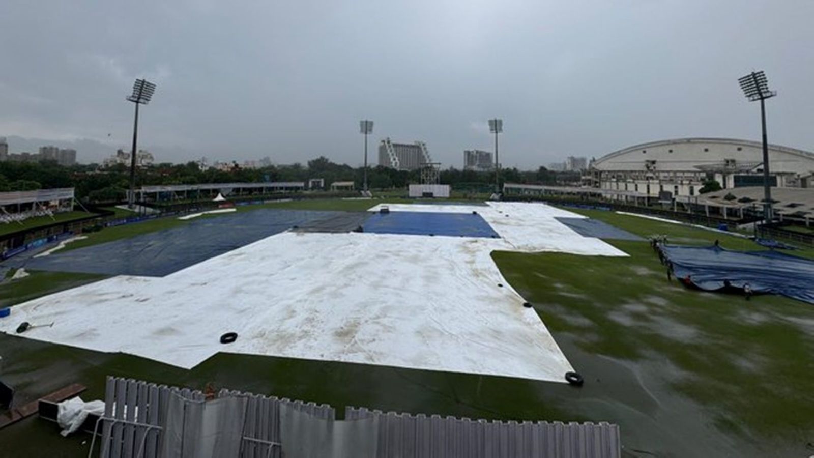AFG vs NZ one-off Test's Day 3 called off as ground staff fail to cover entire ground; New Zealand post photo showing huge wet patches AFG vs NZ one-off Test's Day 3 called off as ground staff fail to cover entire ground; New Zealand post photo showing huge wet patches