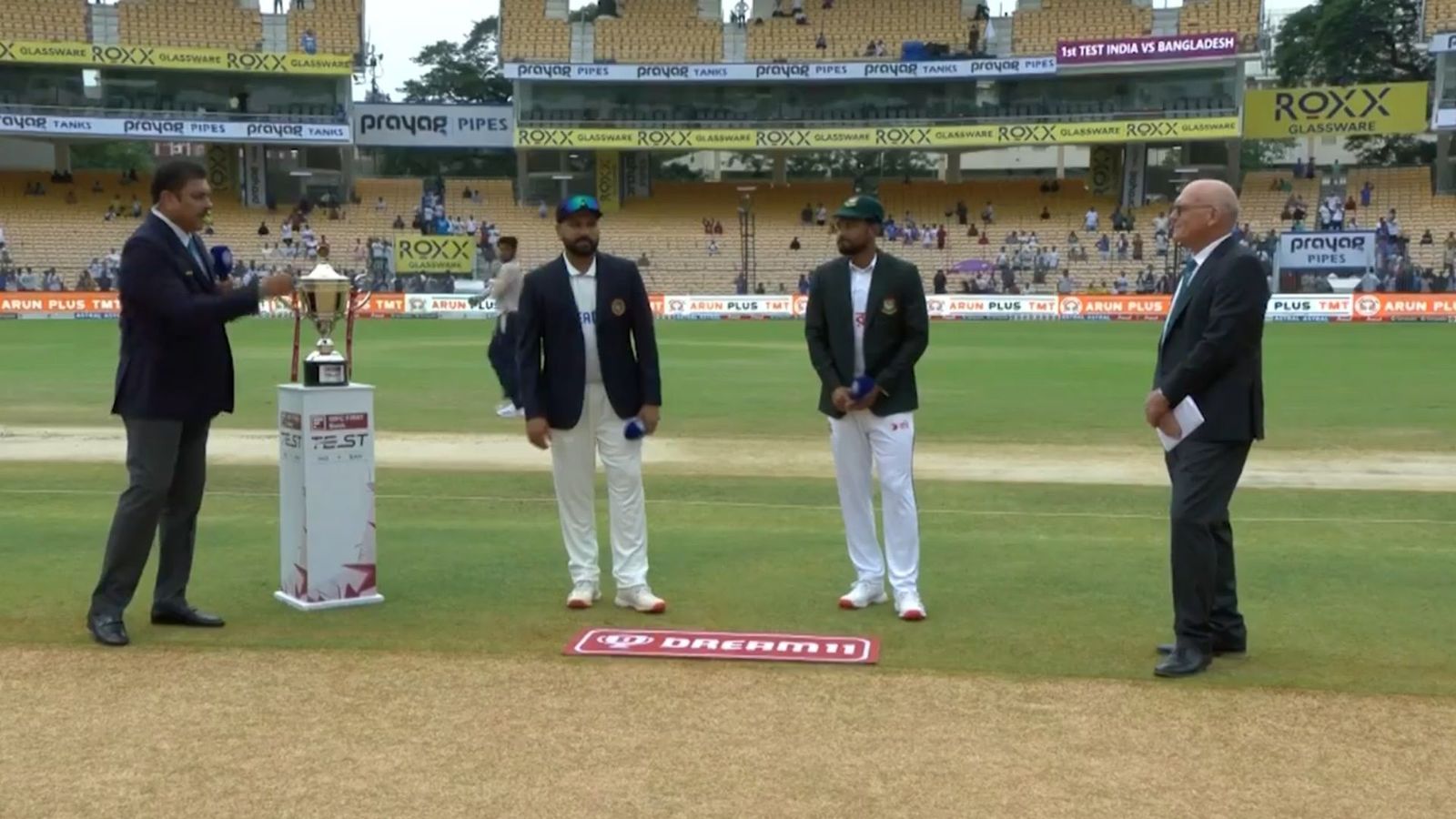 IND vs BAN 1st Test Playing XIs: Rohit Sharma loses toss, picks three seamers as Axar Patel, Kuldeep Yadav find no place in pace-friendly conditions Rohit Sharma and Najmul Hossain Shanto at the coin toss (Screengrab: X)