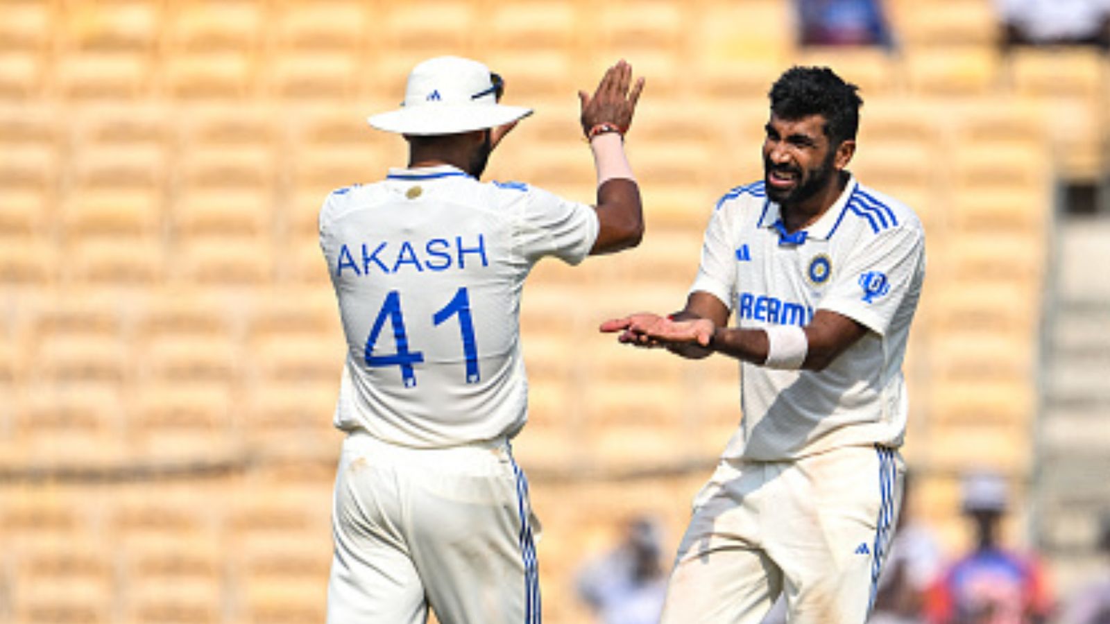 IND vs BAN: Jasprit Bumrah scripts history after clocking 400th international wicket, slots himself in elite list of Anil Kumble, Kapil Dev India's pace spearhead Jasprit Bumrah (right) celebrates with Akash Deep on Day 2 of the first Test against Bangladesh on September 20. (Getty)