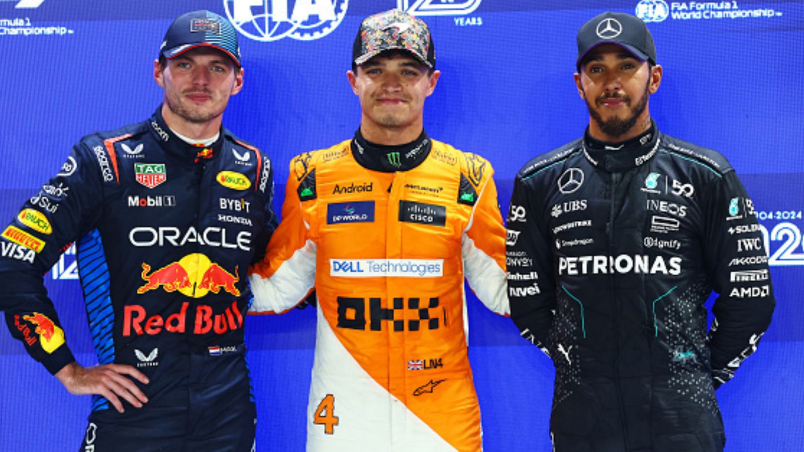 Formula 1: McLaren's Lando Norris beats Max Verstappen to take pole position in Singapore Grand Prix Max Verstappen, Lando Norris and Lewis Hamilton in the frame (Getty)