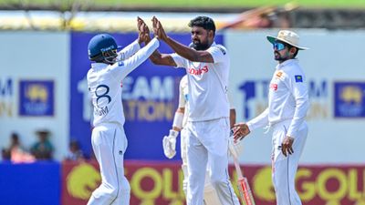 SL vs NZ, 2nd Test: Sri Lanka sniff series sweep as New Zealand left lurching at 199/5 after follow-on, lose 13 wickets on Day 3 Sri Lanka's Prabath Jayasuriya (C) celebrates with teammates after taking the wicket of New Zealand's Kane Williamson during the third day of the second Test cricket match between Sri Lanka and New Zealand at the Galle International Cricket Stadium in
