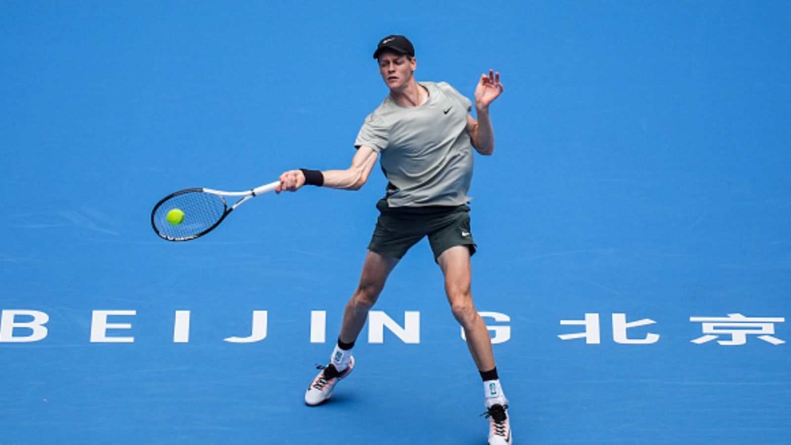 Jannik Sinner advances in Beijing after surviving Nicolas Jarry scare; Taylor Fritz's Japan Open hopes ends Jannik Sinner of Italy plays a forehand in the Men's Singles First Round match against Nicolas Jarry of Chile during day four of the 2024 China Open at National Tennis Center on September 26, 2024 in Beijing, China. (Getty)