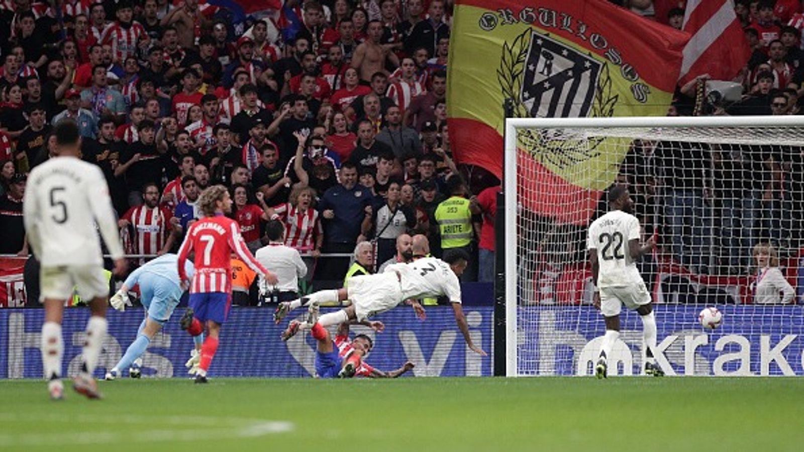 Atletico equalise late against Madrid in derby interrupted after objects thrown on the field Angel Correa of Atletico de Madrid scores their opening goal during the LaLiga match against Real Madrid CF