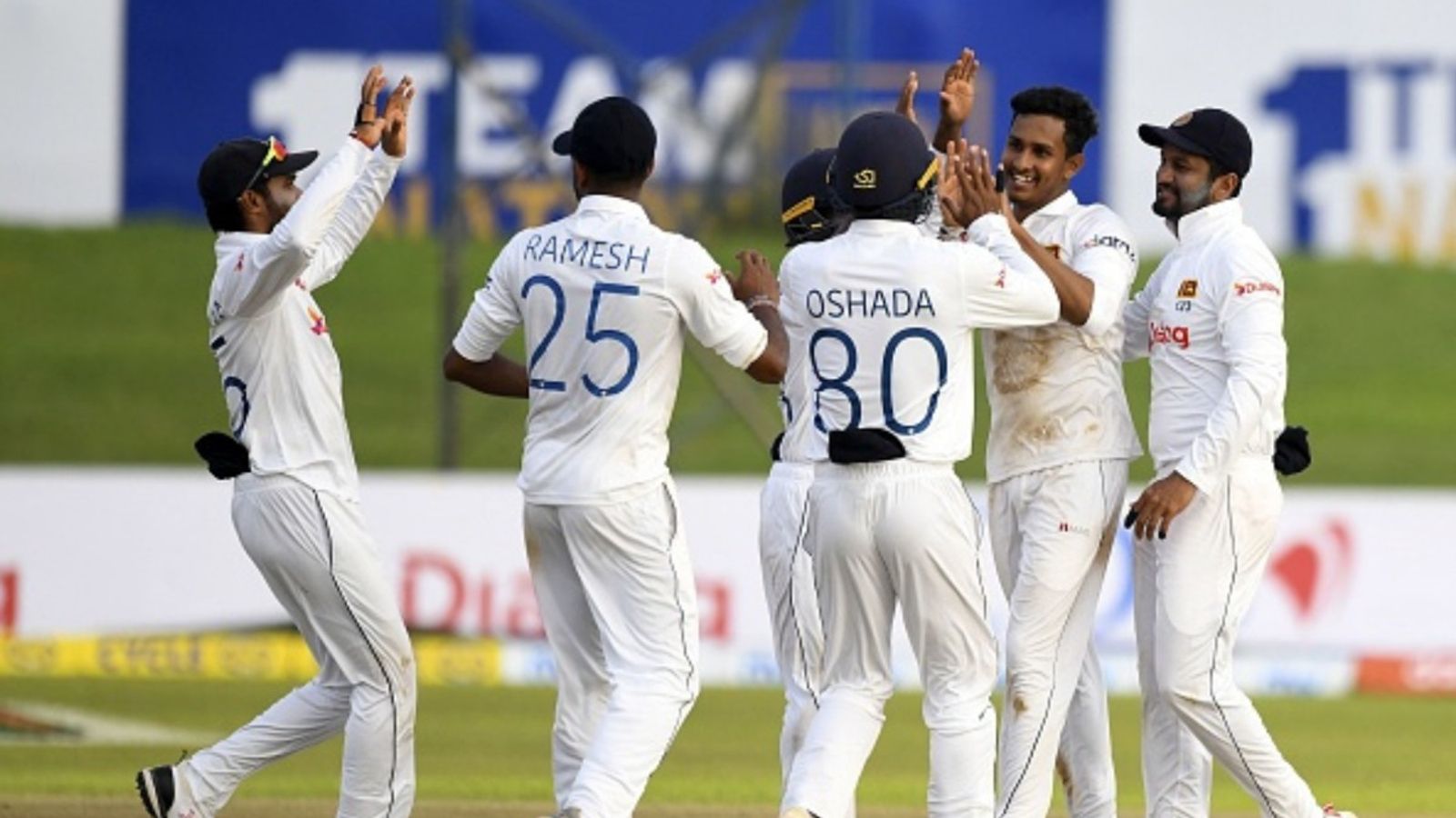 Big News: ICC bans Sri Lanka's 26-yr-old star from all forms of cricket following team's Test series win against New Zealand File Photo: Sri Lanka's Praveen Jayawickrama (2R) celebrates with teammates during a Test match against West Indies cricket on November 22, 2021. (Getty)