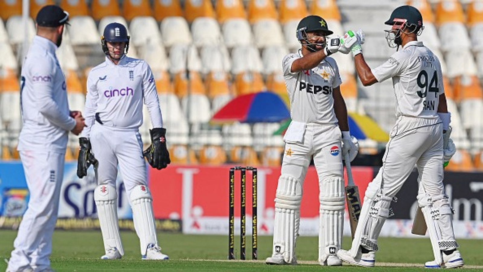 'bowlers GRAVEYARD!', 'Looks like a road...': Former England captains' blunt take on Multan pitch as Pakistan batters dominate on Day 1 Pakistan's Abdullah Shafique (2R) celebrates wtih his captain Shan Masood (R) after scoring a century during the first day of the first Test cricket match in Multan