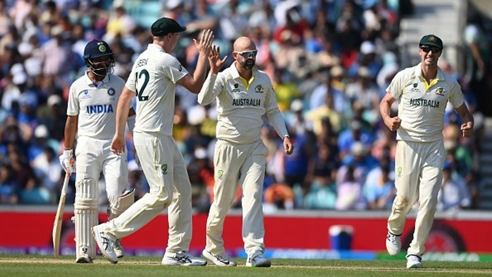 Huge blow to Australia ahead of Border-Gavaskar Trophy, star player ruled out for six months due to stress fracture Nathan Lyon celebrates a wicket with teammates Cameron Green and Pat Cummins