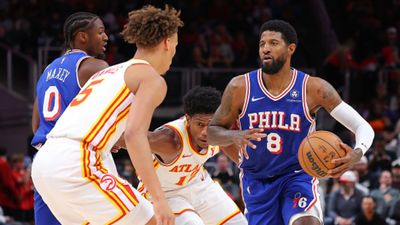 Nine-time All star suffers knee injury in second NBA pre-season game with Philadelphia 76ers Paul George #8 of the Philadelphia 76ers drives against De'Andre Hunter #12 and Dyson Daniels #5 of the Atlanta Hawks during the first quarter at State Farm Arena on October 14, 2024 in Atlanta, Georgia.