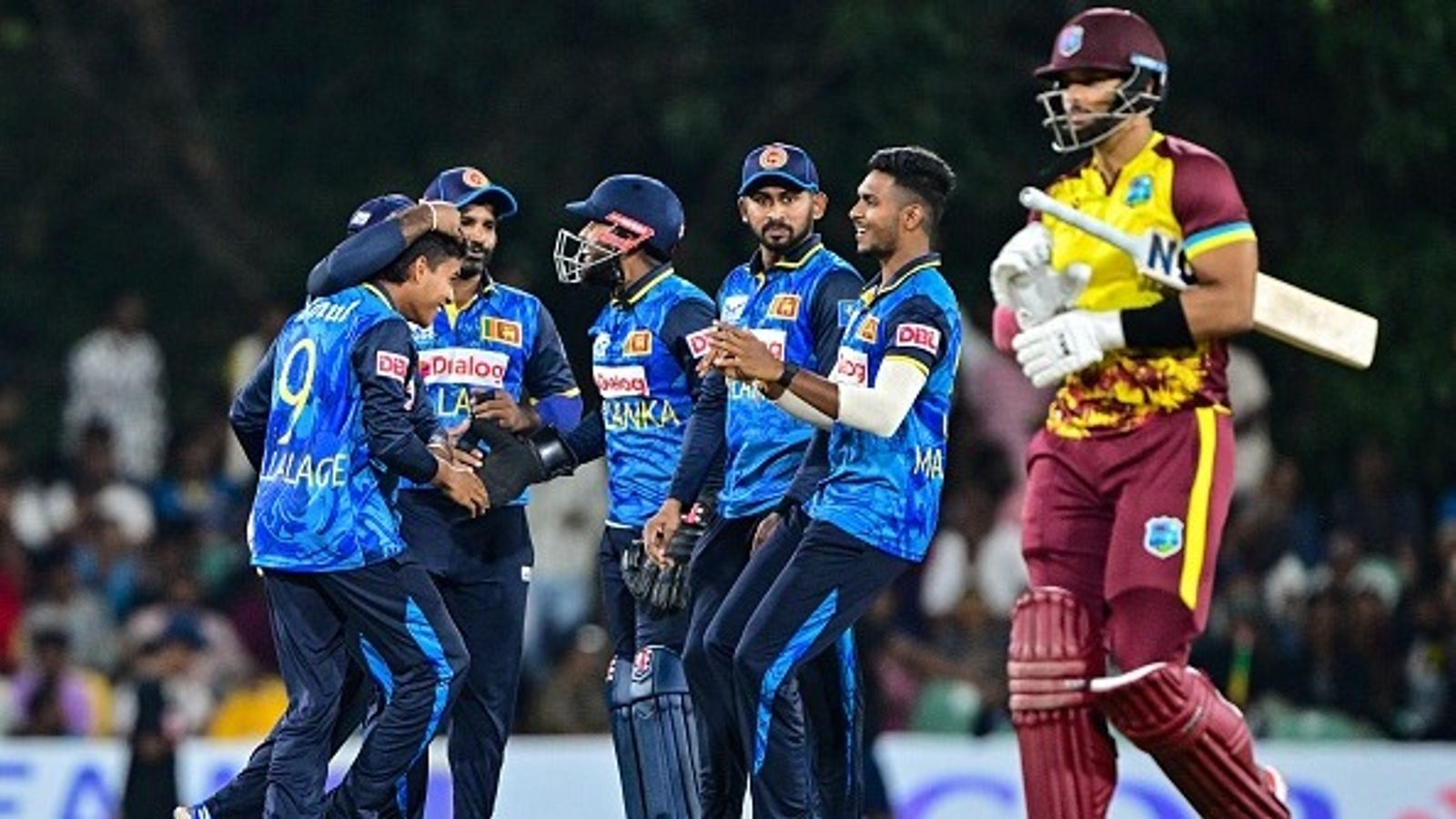 SL vs WI 2nd T20I: West Indies bowled out for 89 as they fall into spin trap, Sri Lanka beat West Indies by 73 runs to level series 1-1 Sri Lanka's Dunith Wellalage (L) celebrates with teammates after taking the wicket of West Indies' Brandon King (R) during 2nd T20I in Dambulla