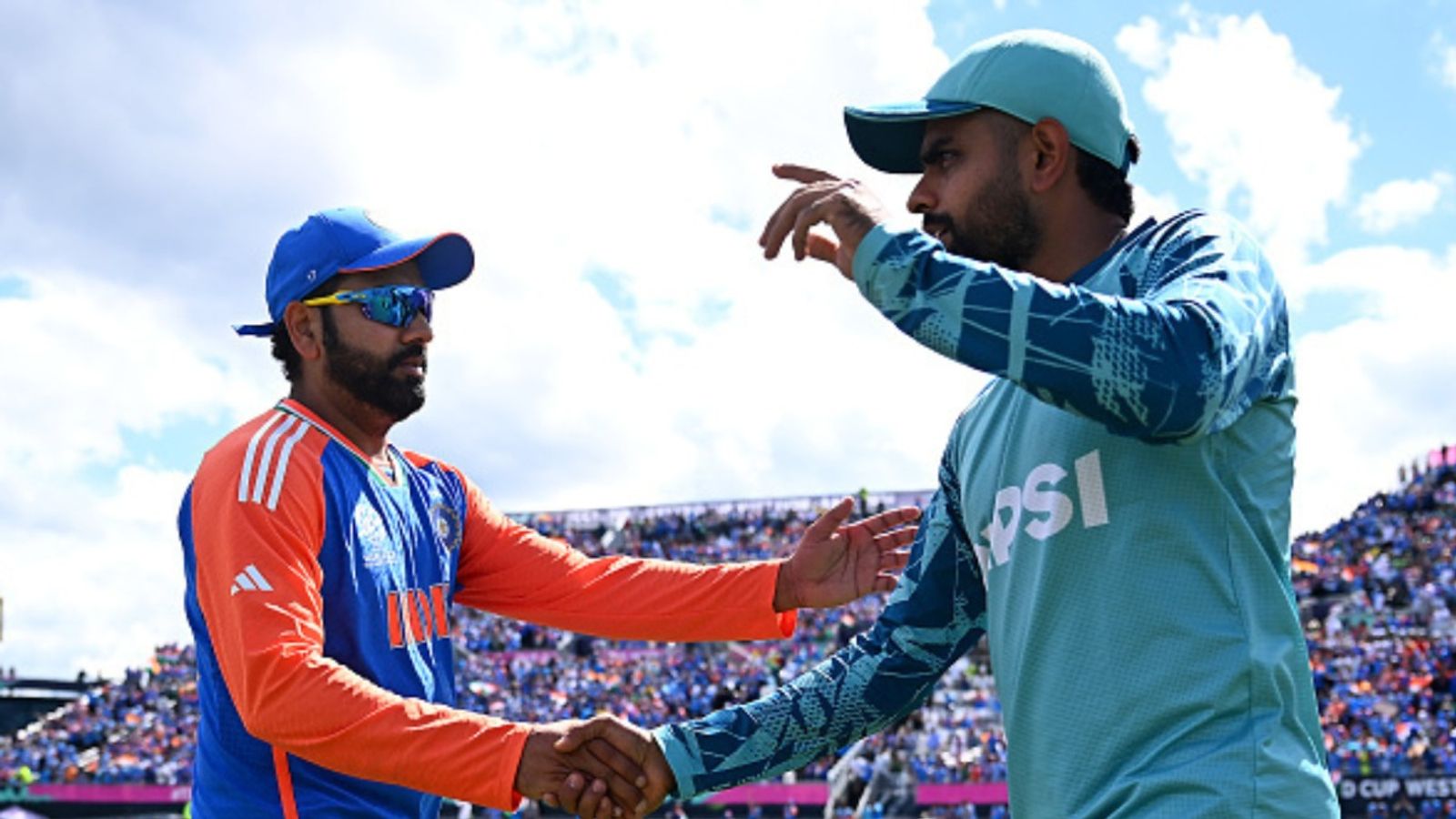 'If you play Champions Trophy without India...': Stern warning issued amidst lack of clarity surrounding CT 2025 in Pakistan India skipper Rohit Sharma (left) and former Pakistan captain Babar Azam in this frame.