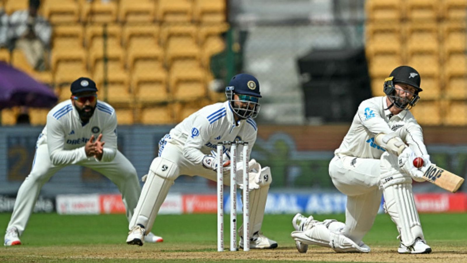 IND vs NZ, 1st Test: Matt Henry's fiery fifer, Devon Conway's 91 put New Zealand on driver seat after pulverising India to mere 46 on Day 2 New Zealand's Devon Conway (R) plays a shot during the second day of the first Test against India at the M. Chinnaswamy Stadium in Bengaluru on October 17, 2024.