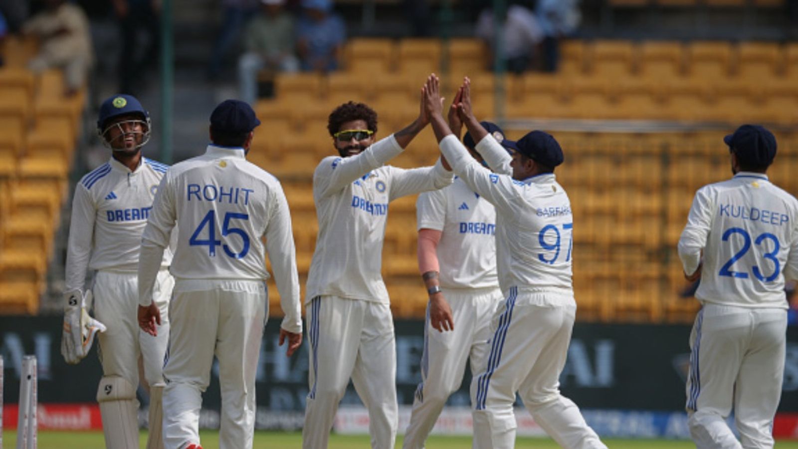 Kuldeep Yadav places his bet on this star batter to salvage India in 1st Test against New Zealand, says 'Hope he scores double hundred...' Ravindra Jadeja (centre) celebrates the wicket of New Zealand's Glenn Phillips with Sarfaraz Khan and his teammates during Day 3 of the first Test at M. Chinnaswamy Stadium on October 18.