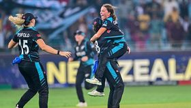 New Zealand's Eden Carson, Georgia Plimmer and Molly Penfold celebrate their victory at the end of the ICC Women's T20 World Cup final match against South Africa on October 20, 2024 New Zealand's Eden Carson, Georgia Plimmer and Molly Penfold celebrate their victory at the end of the ICC Women's T20 World Cup final match against South Africa on October 20, 2024
