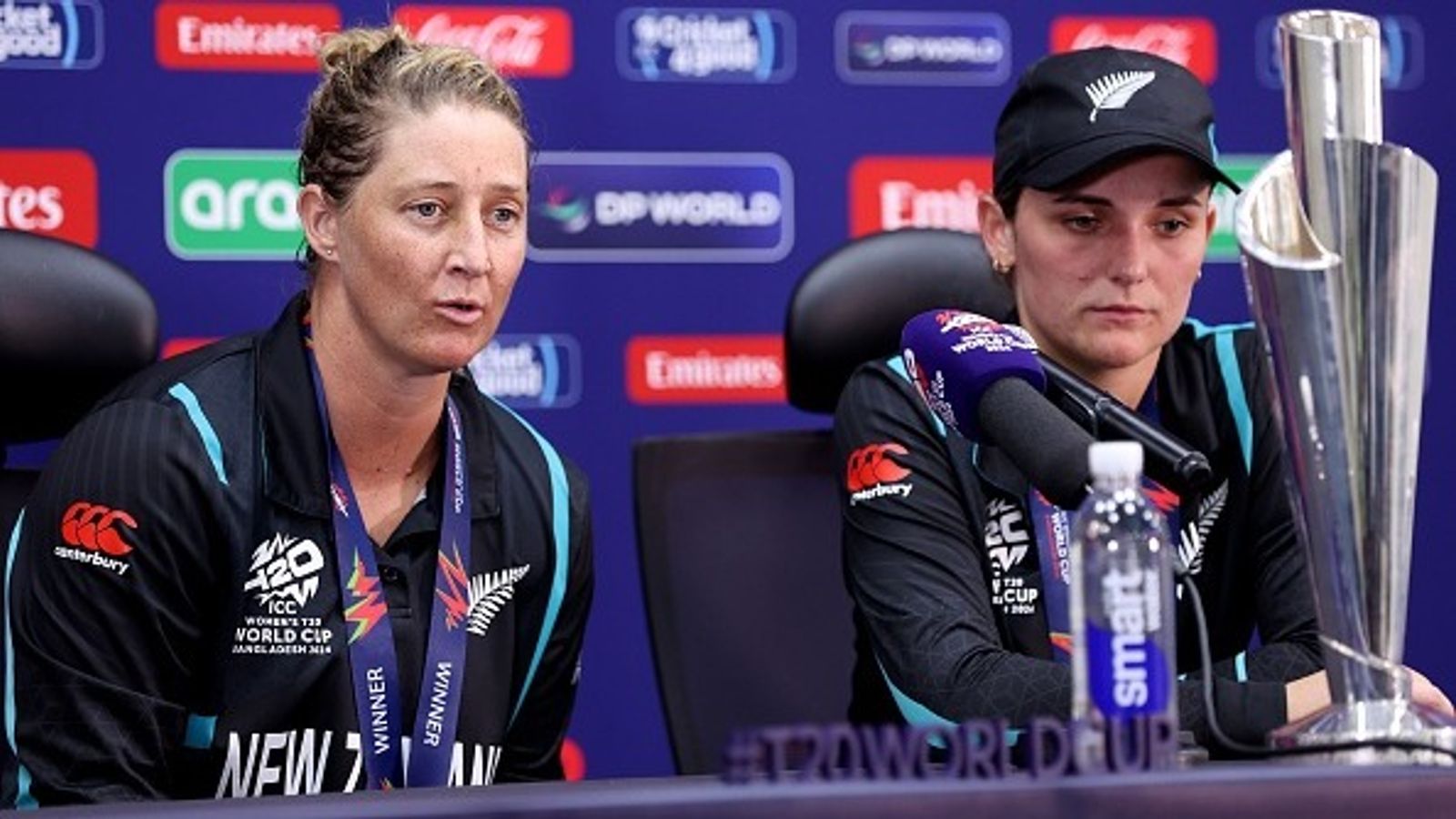 'India one probably set the tone for us': New Zealand captain Sophie Devine feels win against Harmanpreet Kaur's side led to historic run in Women's T20 World Cup 2024 Sophie Devine and Melie Kerr of New Zealand speaks to the media, as the ICC Women's T20 World Cup Trophy can be seen, after defeating South Africa in the final