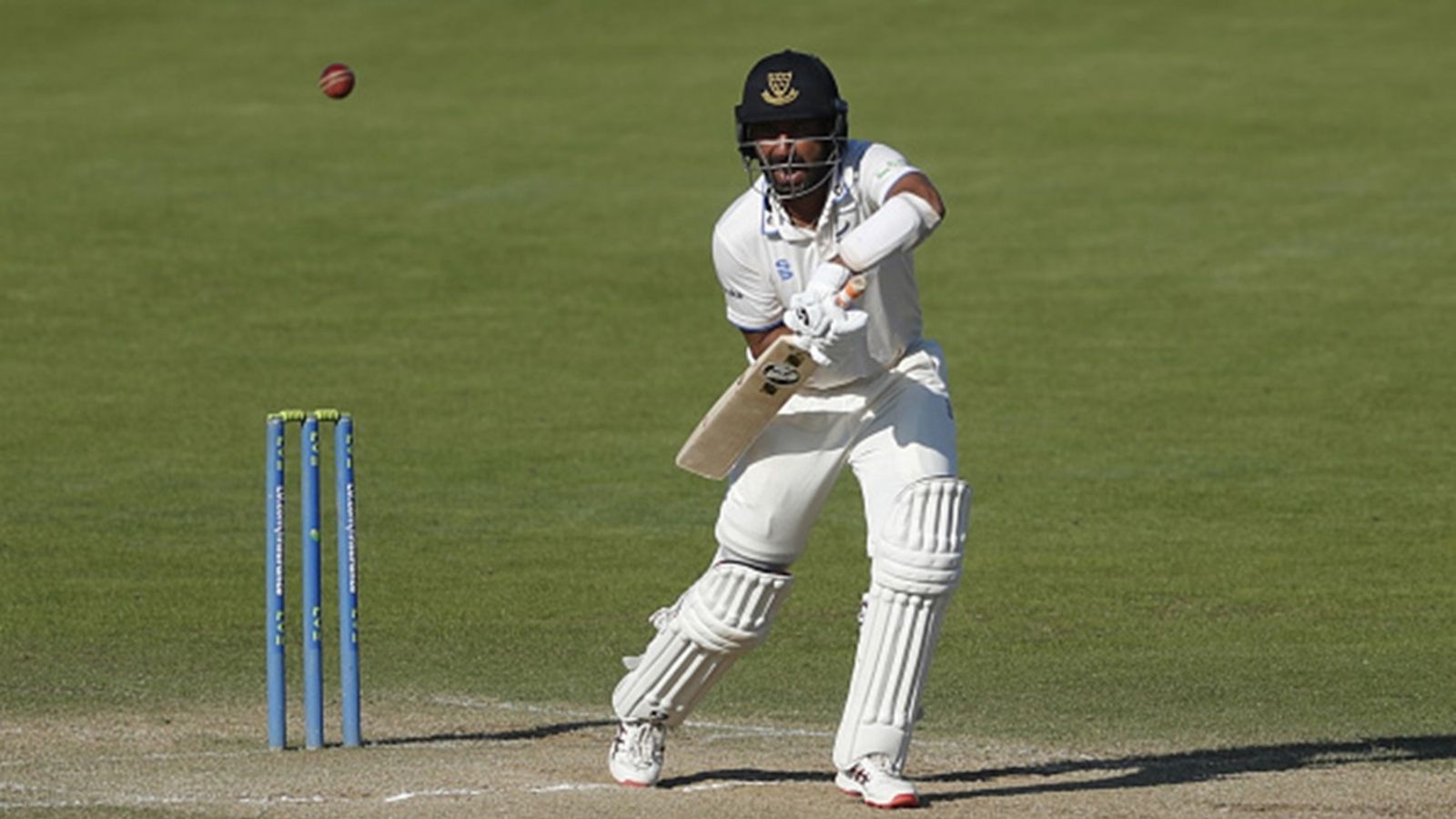 Out-of-favour Cheteshwar Pujara knocks on selectors' doors again with 66th first-class hundred to complete 21,000 runs in format Sussex's Cheteshwar Pujara in action during day three of the County Championship division two match against Durham.