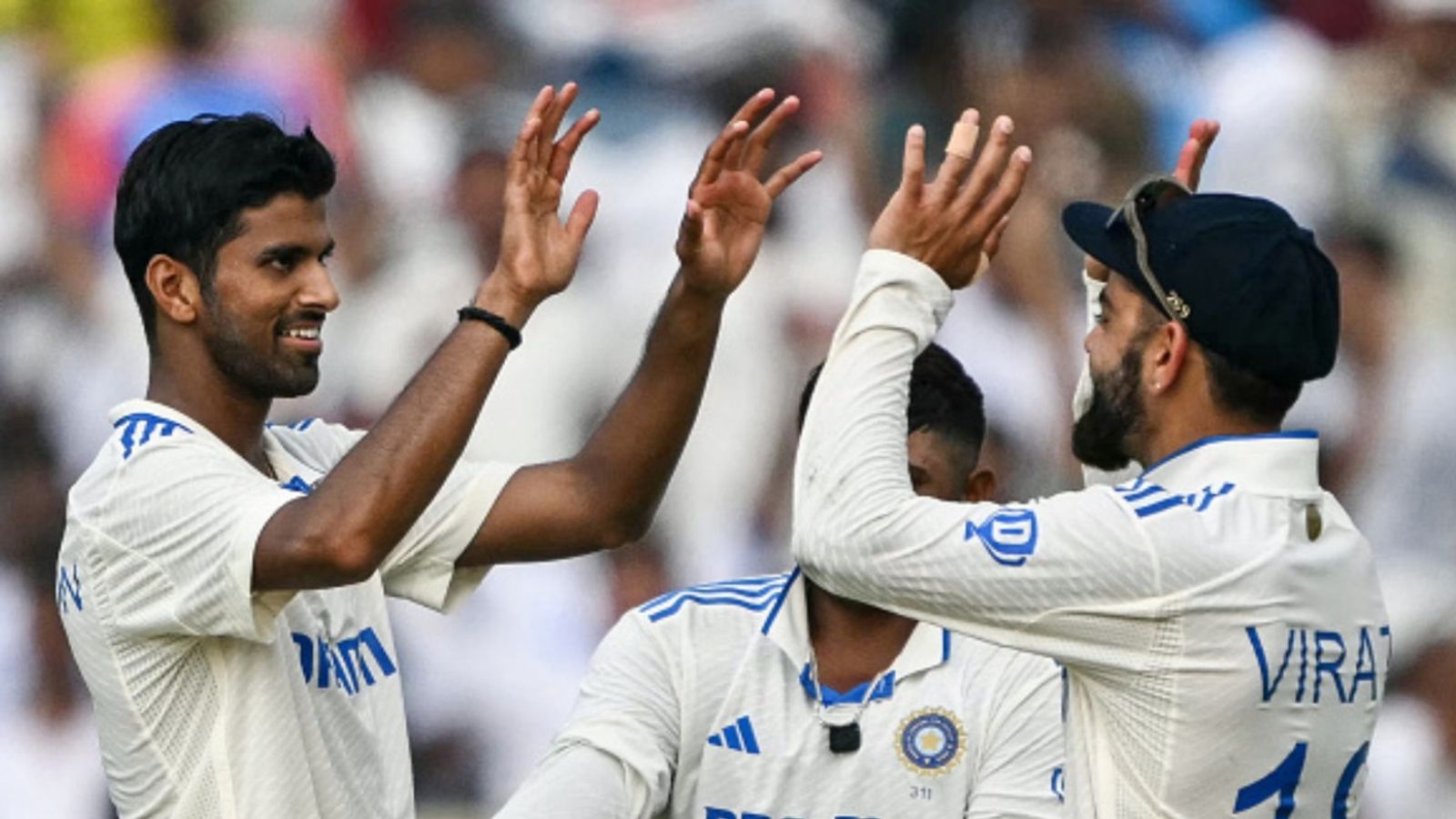 IND vs NZ: Washington Sundar scripts history, clocks multiple records with havoc-loaded seven-fer rock New Zealand in 2nd Test India's Washington Sundar celebrates with Virat Kohli after dismissing a New Zealand batter on Day 1 of the second Test