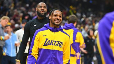 LeBron James son Bronny James scores his first NBA points says, 'Unbelievable' LeBron James and Bronny James in the frame